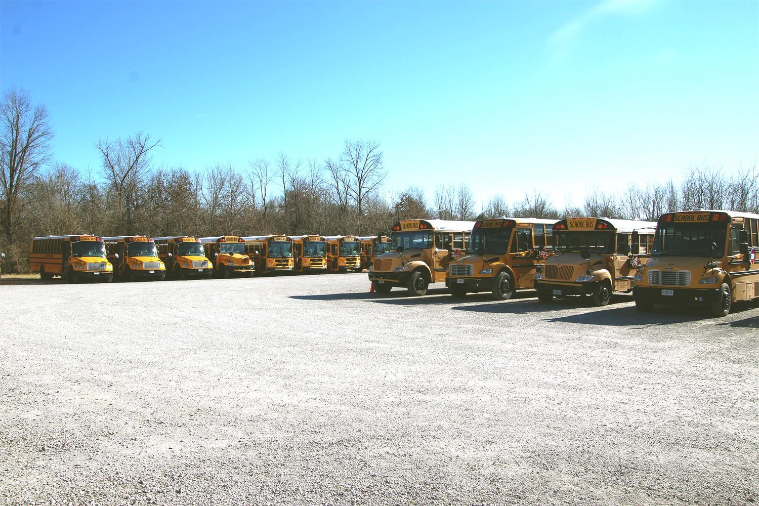 The Bus Barn on Park Avenue shows many empty buses during the afternoon before school lets out for the day.